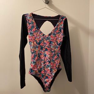 Long sleeve open back body glove swimsuit